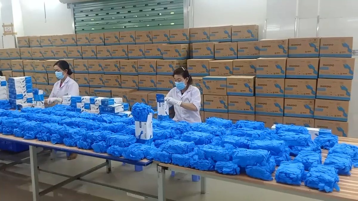 Staff packing bulk medical supplies for distribution